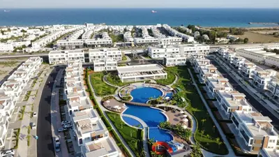 an aerial view of a resort near the ocean at Four seasons sitesi in Aglantzia