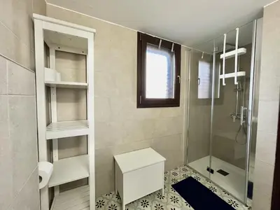 a bathroom with a shower and a toilet and a sink at STAY Perla House in Protaras