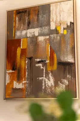 a painting in a frame on a wall at 2 bedroom flat in city centre in Nicosia