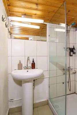 a bathroom with a sink and a shower at City Centre Studio Eleftheria Sq in Nicosia