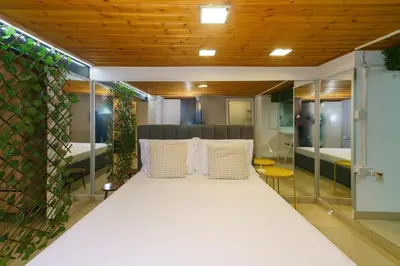 a large bed in a room with two beds at City Centre Studio Eleftheria Sq in Nicosia