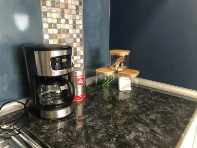 a coffee maker on a counter in a kitchen at Flat in Kyrenia, Cyprus in Kérynia
