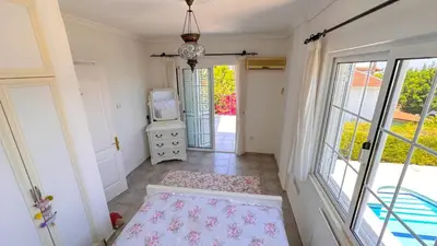 a room with a door leading to a balcony at Villa NATURA in Strovolos