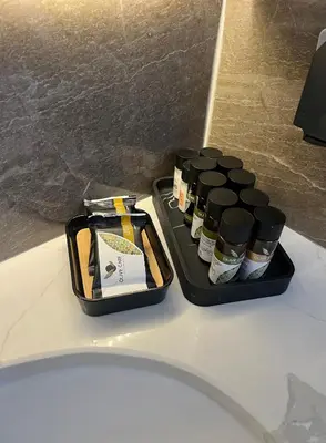 a group of bottles of spices sitting on a tray at Oasis Penthouse Luxury Suite in Limassol