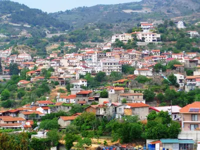 a town on a hill with houses on it at Home in the Hills in Limassol