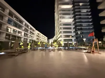 a view of a city at night with tall buildings at Grand Sapphire 22 floor B BLock 377, Cypr Północny in Paralimni