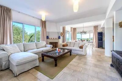 a living room with a couch and a table at Villa Marilena in Protaras