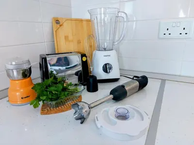 a kitchen counter with a blender on a counter top at Amazing Sea View -3 Bed Ground Floor Garden Apartment in Kérynia