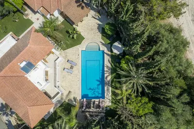 an overhead view of a swimming pool in a house at Blue Pearl Villa - 6 Bedroom in Pyla