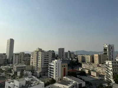a view of a city with tall buildings at Premium City Center 10th Floor Sky View -Suite 103 in Nicosia