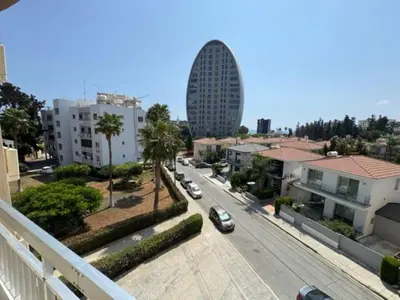 arial view of a city with cars parked on a street at Sfina Sea view apartment by Ezoria villas in Limassol