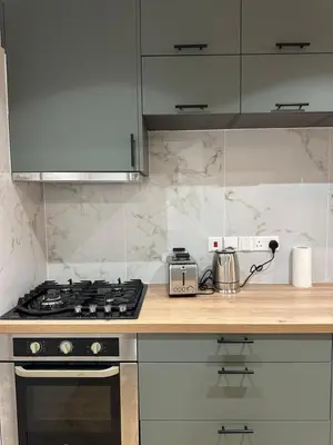 a kitchen with a stove and a counter top at Ayia Napa 1 Studio in Ayia Napa