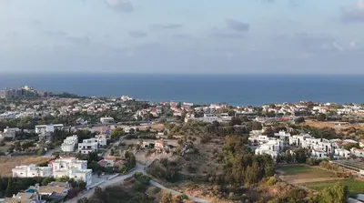 an aerial view of a city and the ocean at A Spacious Villa to Entertain in Aglantzia
