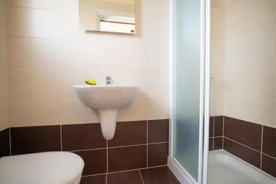 a bathroom with a sink and a toilet and a shower at Malama 2 Villa Ekaterina 2 bedroom in Paralimni