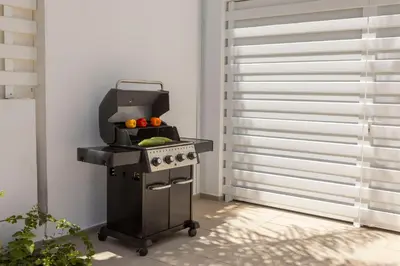 a kitchen with a grill with fruit on it at Protaras Seaside Villa Narcissos 16 in Protaras