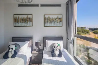 two beds with stuffed animals on them in a bedroom at Villa Almaria ALM28 in Protaras