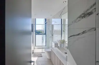 a bathroom with a tub and a toilet and a sink at Villa Almaria ALM28 in Protaras