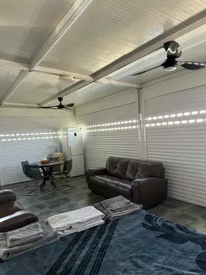 a living room with a couch and a table at Costas court in Limassol