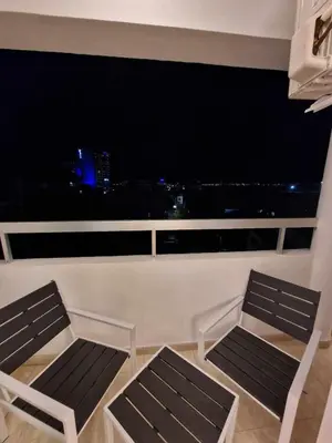 two chairs sitting on a balcony with a view at Seaside View 1-bedroom apartment! in Larnaka