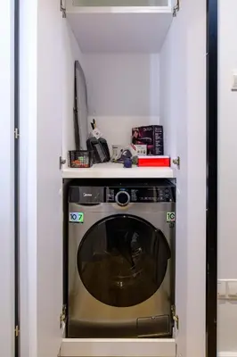 a washer and dryer in a small room at Artemis 302 - Seaside Stories in Livadhia