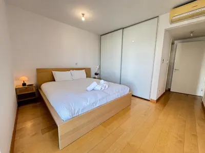a bedroom with a large white bed in a room at Home in Central Nicosia - Spacious Balcony in Nicosia
