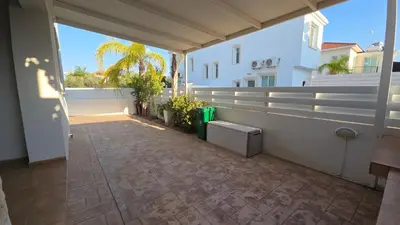 a balcony with a view of a building at Chrystallia Protaras in Paralimni