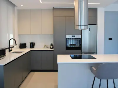 a kitchen with a sink and a refrigerator at Hypnos Park View in Nicosia