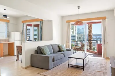 a living room with a couch and a table at Spacious City Centre Living in Nicosia