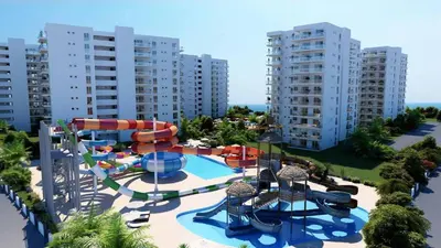 an aerial view of a water park with a water slide at Modern Smart-Home Studio Pools Gym Terrace View in Paralimni