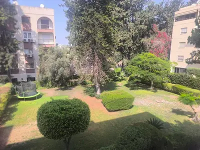 an aerial view of a park with trees and bushes at Lux studio apartment in Limassol