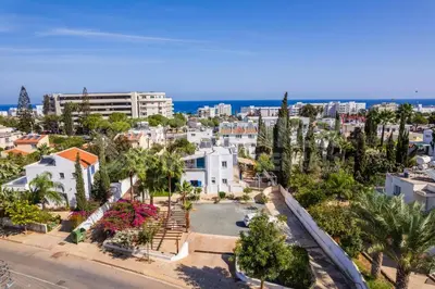 an aerial view of a city with trees and buildings at Apartment Ino in Protaras