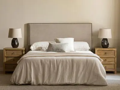 a bedroom with a large bed with two night stands at Sanders Soul Apartments - Full Building in Limassol
