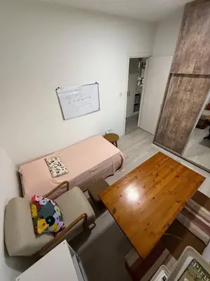 a small room with a bed and a table at Central Nicosia Haven in Nicosia