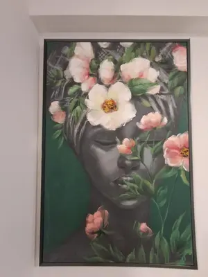 a painting of a woman with flowers on her head at Lazuli City Center Studio 161 - 100 m from the beach in Larnaka