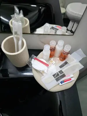 a tray with toothbrushes and other items on a table at 5mins from the beach,10mins from LC airport Aurelia Suite in Larnaka