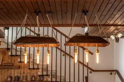 two chandeliers hanging from the ceiling in a room at Maison du Mont in Kalopanayiotis