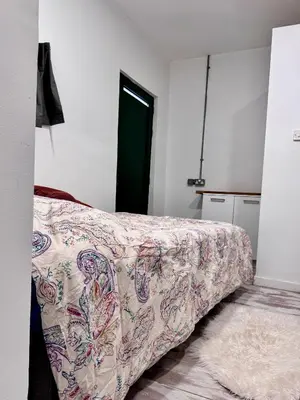 a bedroom with a bed with a blanket on it at Central Nicosia 1BR House in the Walled City in Nicosia