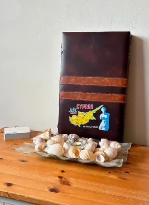a box of shells sitting on top of a table at Kapparis Beach Escape in Paralimni