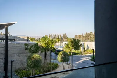 a view of a street from a window of a building at Luxe One Residence in Aglantzia