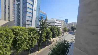 a view of a city street with trees and buildings at STAY Fantasia Central Suite in Nicosia