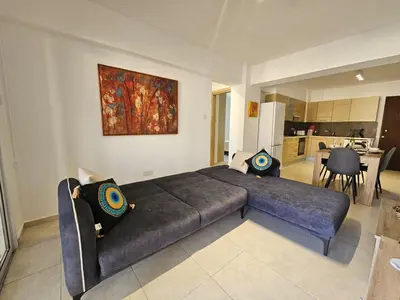 a bedroom with a large bed with pillows on it at Horizon View 2 in Kiti