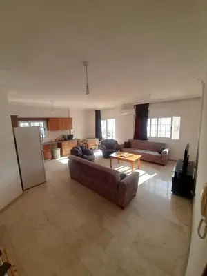 a large living room with couches and a table at Daire in Kaimakli