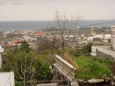 a view of a city from a hill with a staircase at Historic 600 years old beautifully renovated Mill House in Meniko