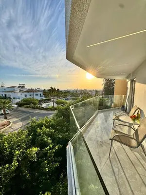 a balcony with a view of a street at Napa Skyline Suite 3BR Sunset Views and Pool in Ayia Napa