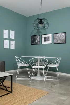 a table and two chairs in a room at Bright 2BR by Pedieos Park, near Old Town in Nicosia