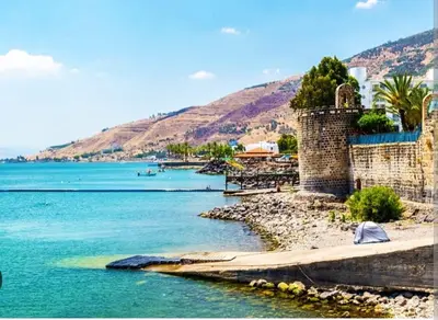 a view of a body of water with a mountain at Hotel apartment studio in Dherinia