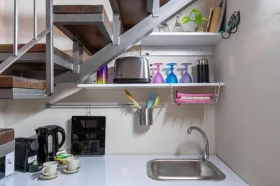 a kitchen counter with a sink and some shelves at Villa Monti Cozy Yard & BBQ Perfect for Families & Friends in Kato Lefkara