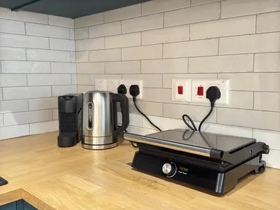 a coffee machine sitting on top of a counter at GameHouse in the City Center in Nicosia