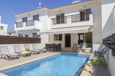 a villa with a swimming pool and a house at SunnyVillas 3BR House Private Pool POLY in Protaras