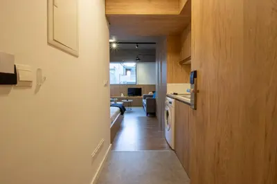 a hallway leading to a living room and a kitchen at M-Studios - Luxury studios in the heart of Limassol in Limassol